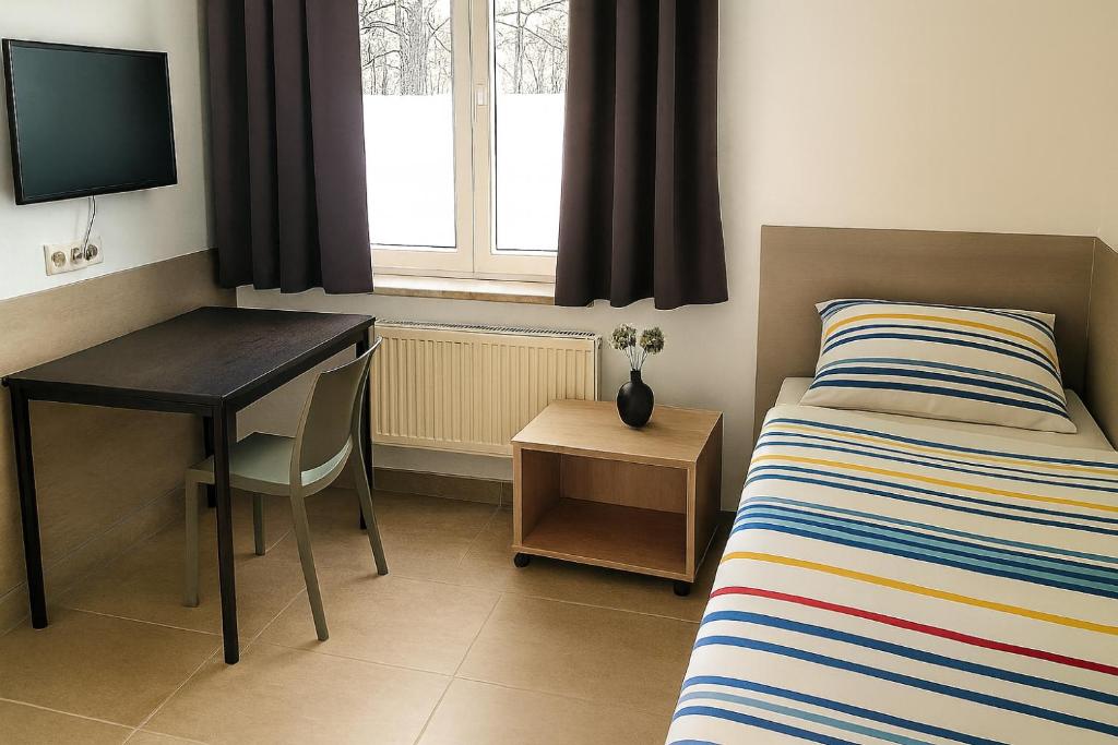 Postel nebo postele na pokoji v ubytování Monteurzimmer24-Leuna