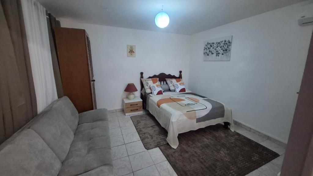 Postel nebo postele na pokoji v ubytování Oasis de Suzini