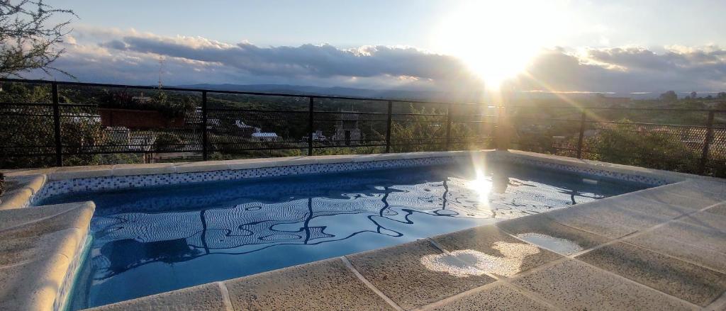 Πισίνα στο ή κοντά στο Cabañas La Puesta del Sol