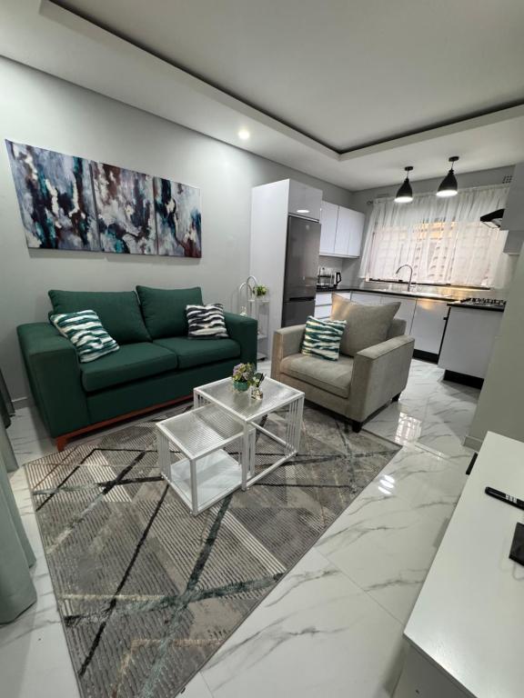 Η κουζίνα ή μικρή κουζίνα στο MAITA Apartments