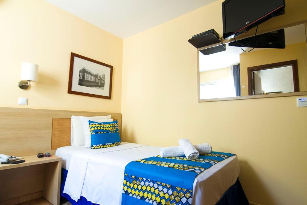 TV a/nebo společenská místnost v ubytování Hotel Santa Maria