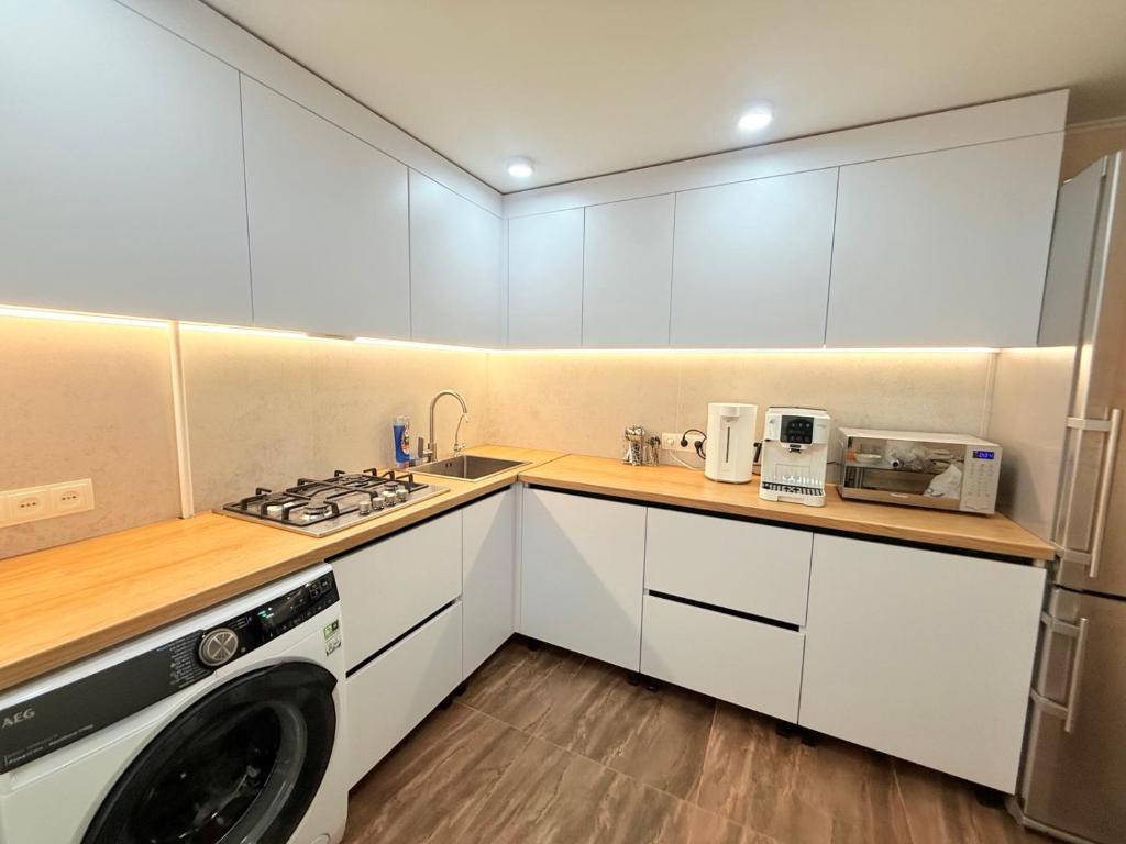 Kuchyň nebo kuchyňský kout v ubytování Хостел с кабинками в центре CABIN HOSTEL city center