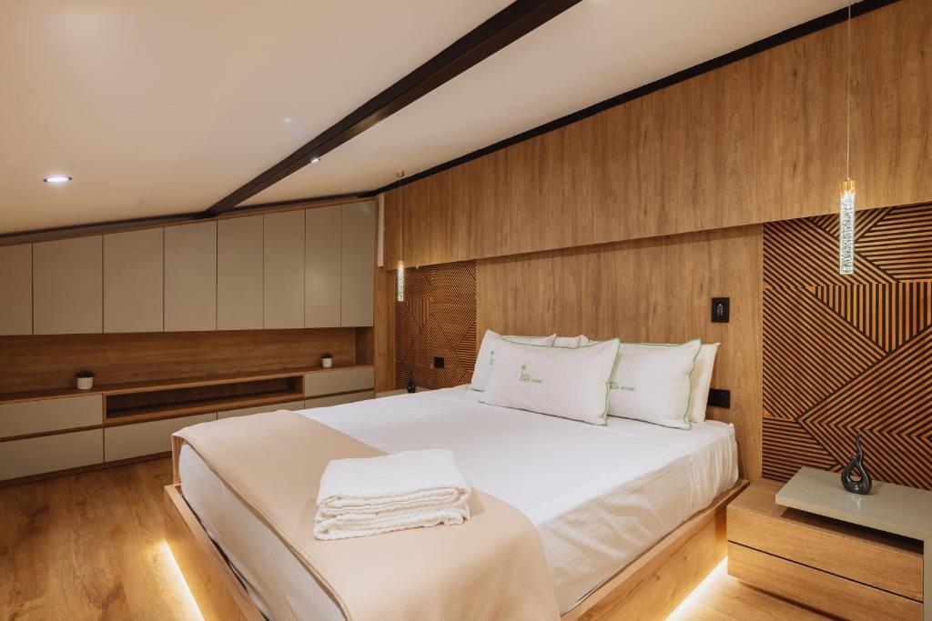 Ένα ή περισσότερα κρεβάτια σε δωμάτιο στο Green House Hotel