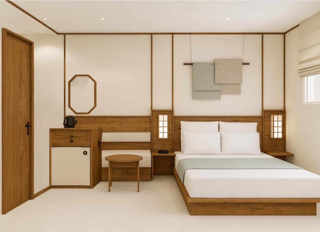 Postel nebo postele na pokoji v ubytování Hotel Flow-er