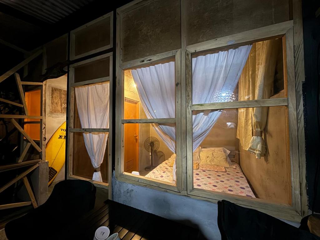 Ένα ή περισσότερα κρεβάτια σε δωμάτιο στο Lola Sayong Xanti 'Silong