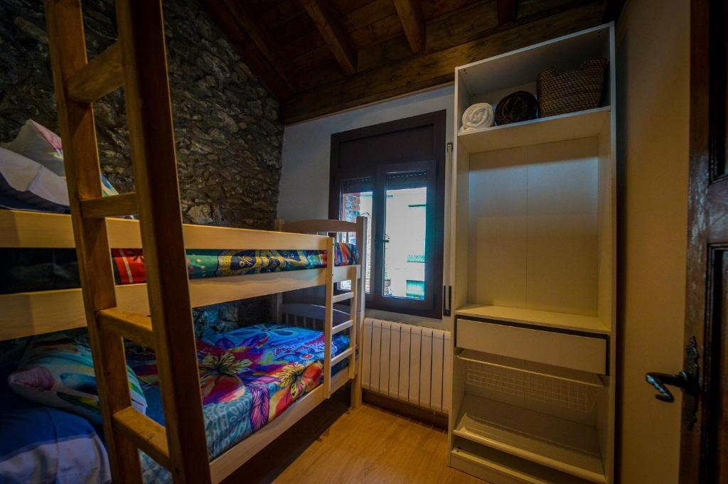 Postel nebo postele na pokoji v ubytování Apartaments Cal Xic