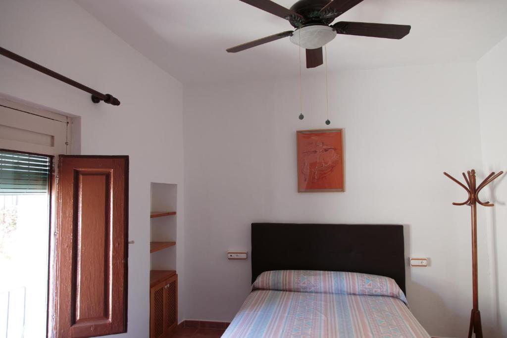Postel nebo postele na pokoji v ubytování Casa del Mesoncico