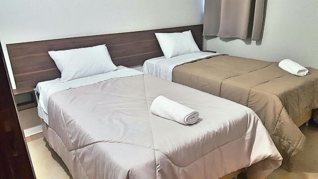 Postel nebo postele na pokoji v ubytování Hotel Sur Brasil