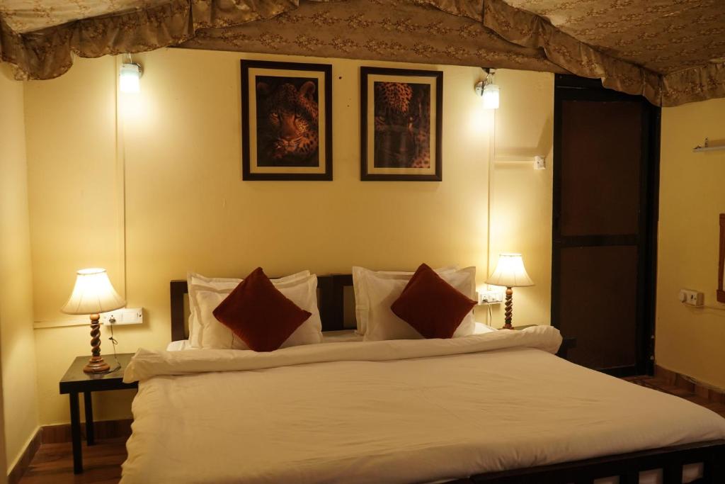 Ένα ή περισσότερα κρεβάτια σε δωμάτιο στο Shikaar Valley