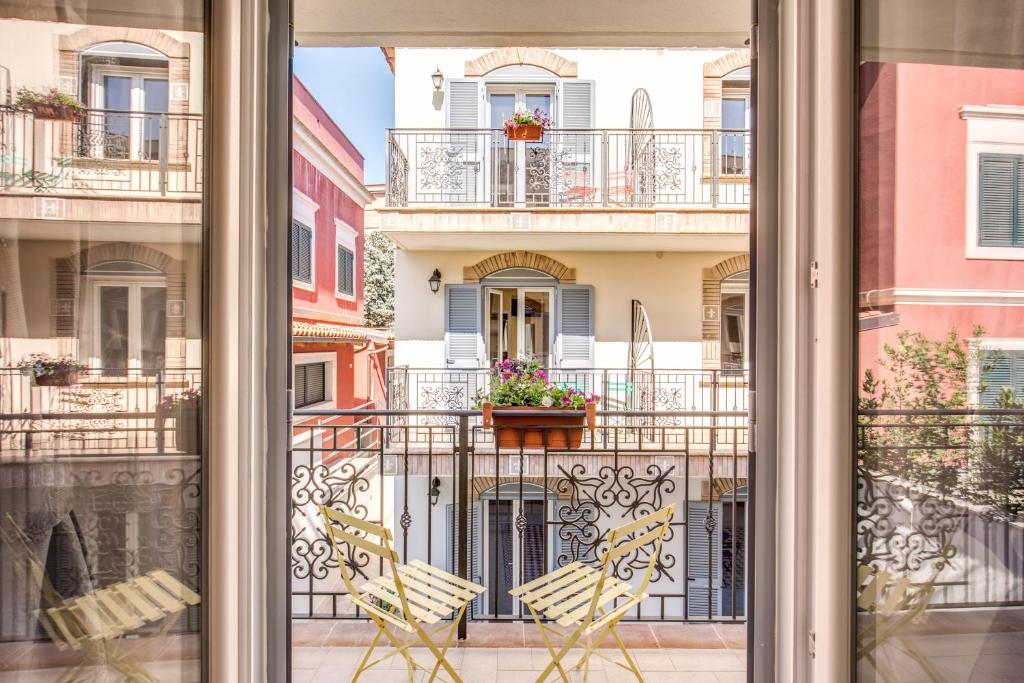 a view of a balcony from a window at The Bricks Rome in Rome