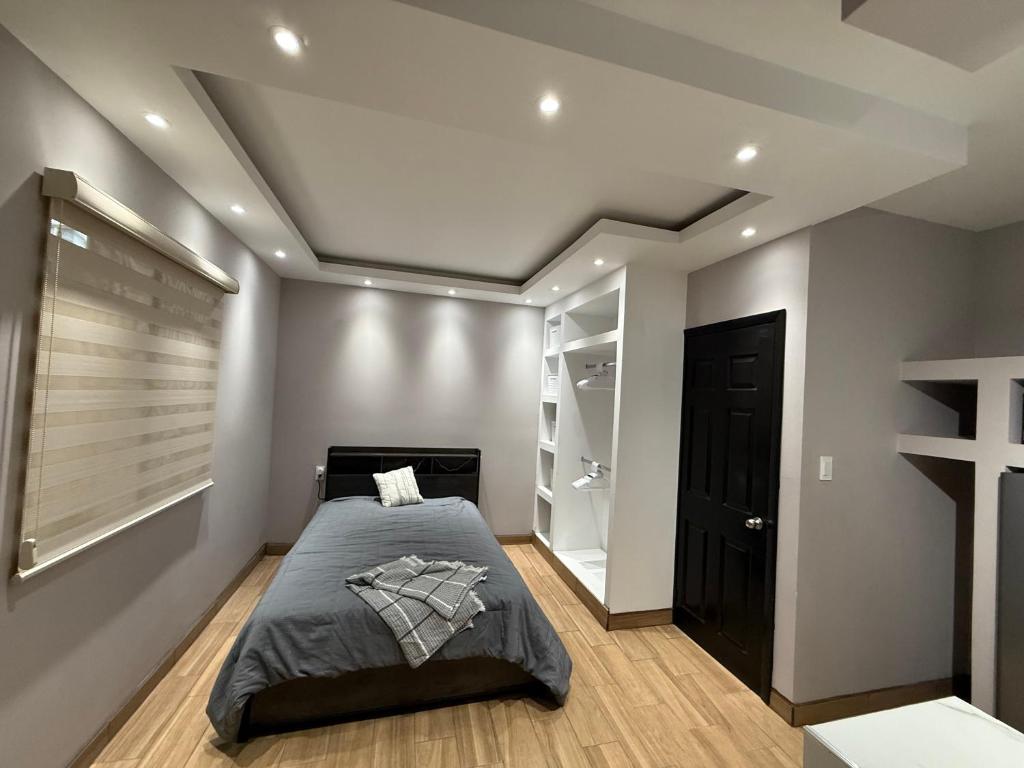 Postel nebo postele na pokoji v ubytování Lago Premium Stay