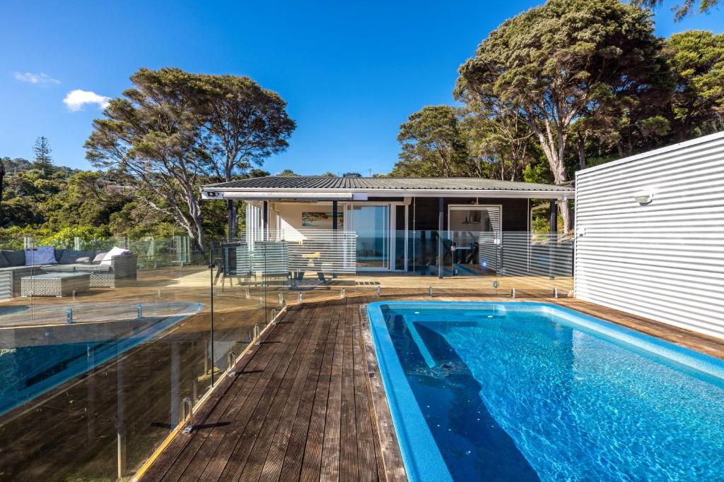 an image of a swimming pool in a house at Onetangi Ocean View - Waiheke Island in Waiheke Island