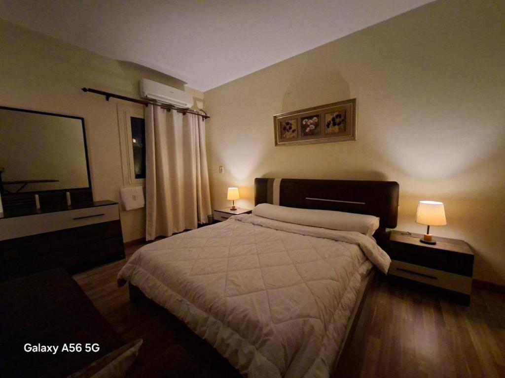 Ліжко або ліжка в номері The Address Modern apartment