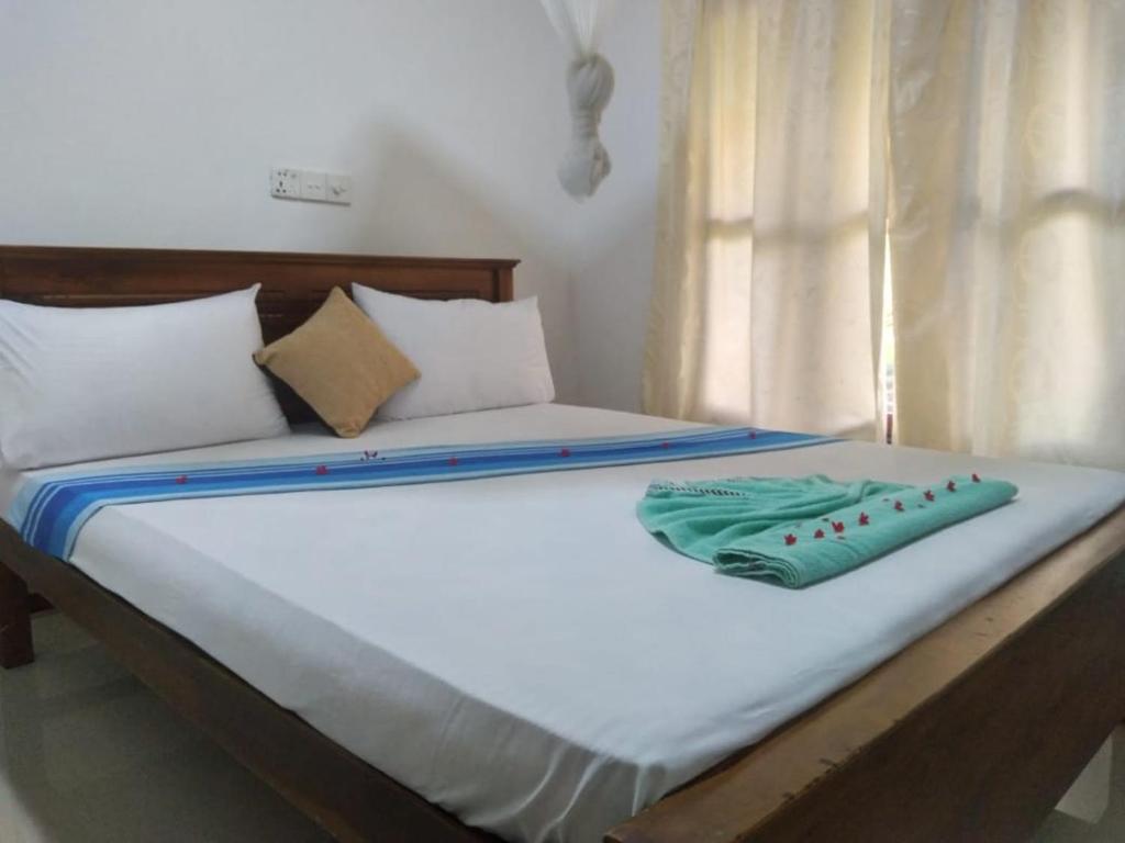 Una cama o camas en una habitación de Hide Jungle