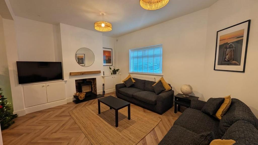 Televiisor ja/või meelelahutuskeskus majutusasutuses Welcome to the Cobbler's at Barry Island