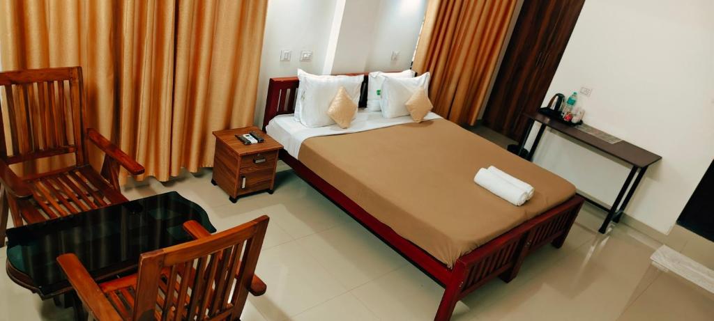 Voodi või voodid majutusasutuse Oxxon Airport Hotel toas