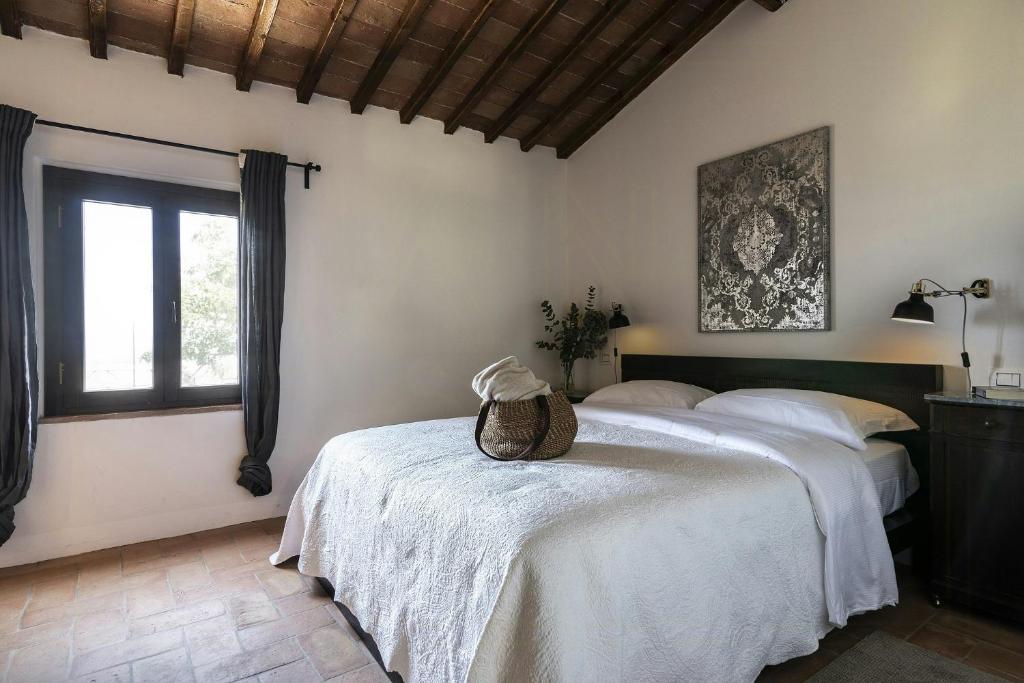 Giường trong phòng chung tại Panoramic Apartment In 17Th Century Farmhouse