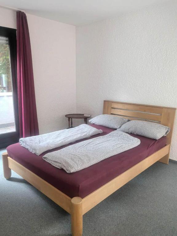 Ένα ή περισσότερα κρεβάτια σε δωμάτιο στο Schönes Apartment 12-2 Uni-Mainz