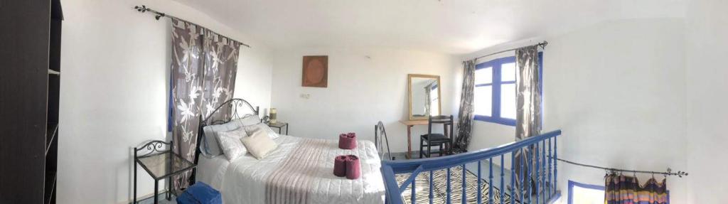 Ένα ή περισσότερα κρεβάτια σε δωμάτιο στο Rhythm house