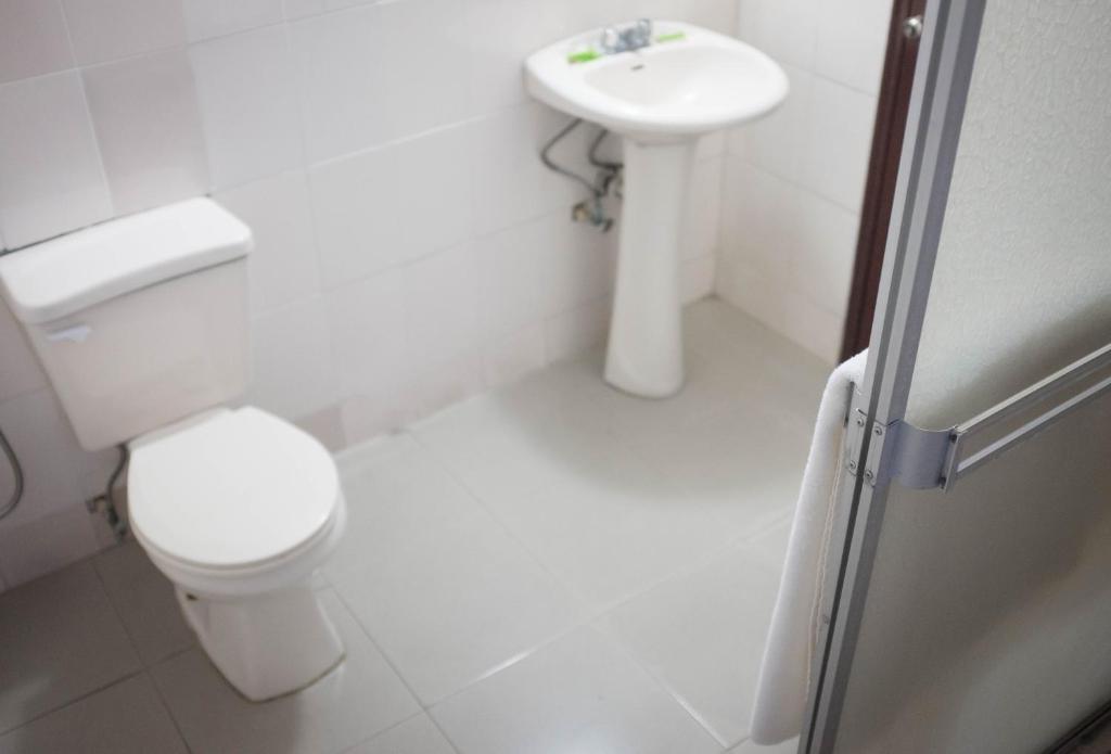 Koupelna v ubytování Hotel Latino