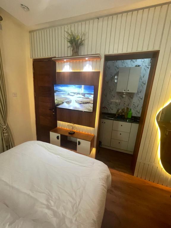 Μια τηλεόραση ή/και κέντρο ψυχαγωγίας στο Guesthaven Shortlet