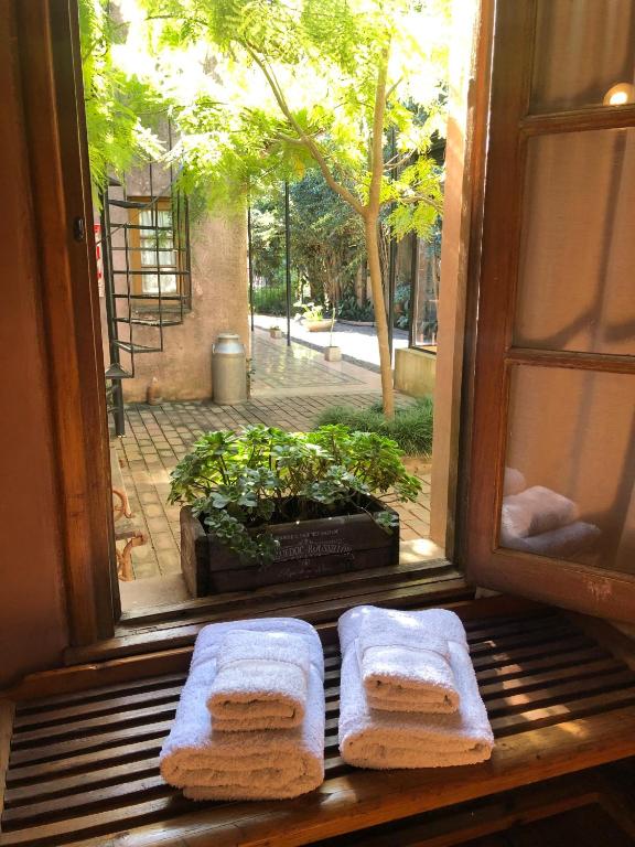 two slices of bread sitting on a window sill at Antigua Casona Bed & Breakfast in San Antonio de Areco