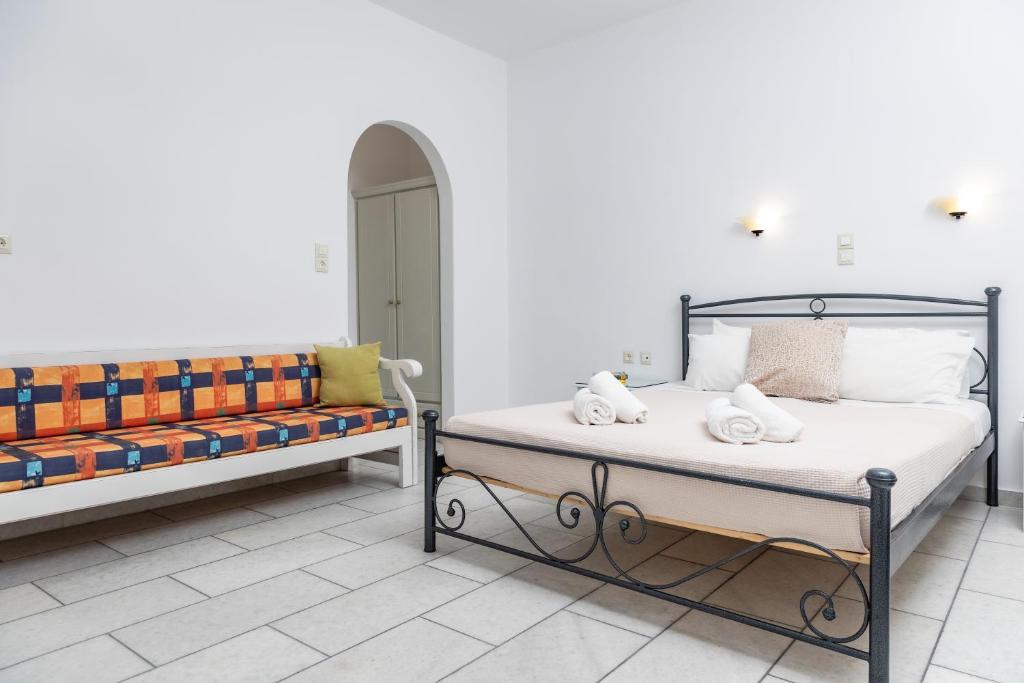 Ένα ή περισσότερα κρεβάτια σε δωμάτιο στο Depis studios