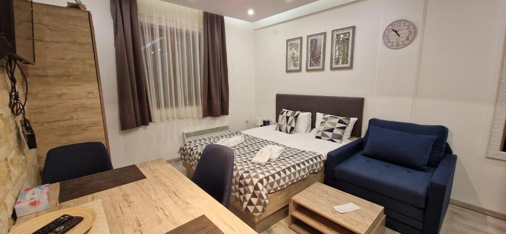 Ένα ή περισσότερα κρεβάτια σε δωμάτιο στο LUX Milmari L Apartments