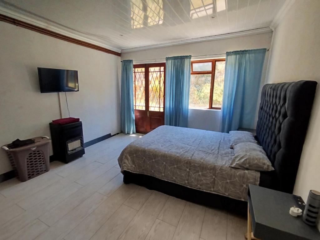 Ένα ή περισσότερα κρεβάτια σε δωμάτιο στο Saldanha Vista Heights