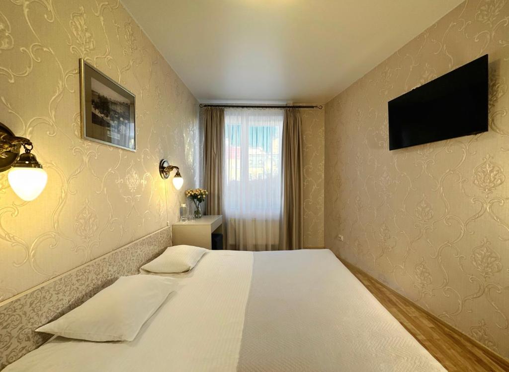 TV a/nebo společenská místnost v ubytování Hotel Plazma