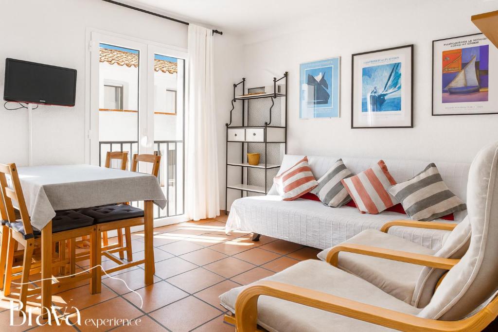 Et opholdsområde på Casa Llúcia - Check-out 1 pm I 3' playa I planta baja I céntrico I equipado