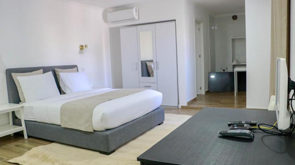 Postel nebo postele na pokoji v ubytování Onzo Yamy