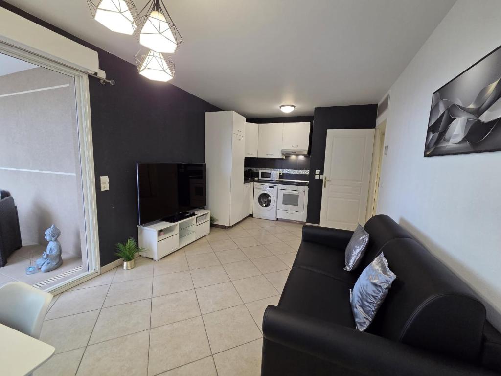 Η κουζίνα ή μικρή κουζίνα στο 5mn Monaco - Terrasse aperçu mer - Parking - FA