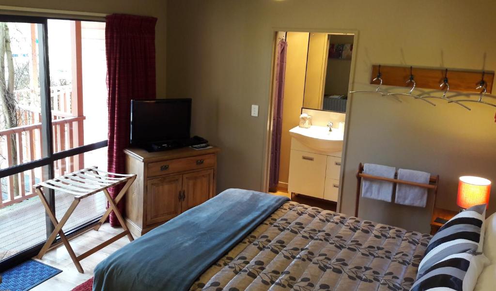 Postel nebo postele na pokoji v ubytování Serenity Motels