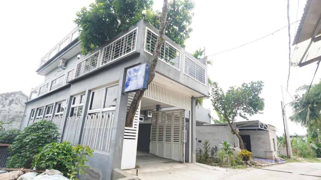 a building with a balcony on top of it at JS Sentul City Syariah in Cibitung