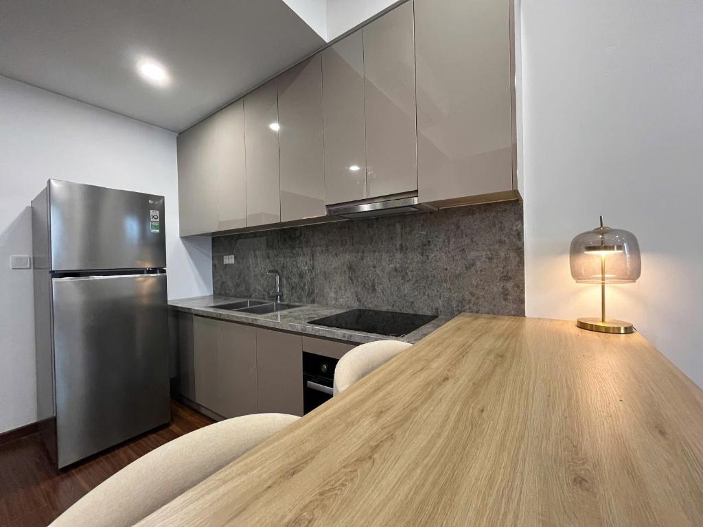 Nhà bếp/bếp nhỏ tại Sora House 10 - Vinhomes Ocean Park