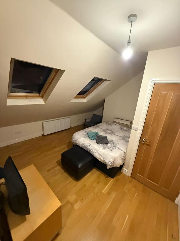 Ένα ή περισσότερα κρεβάτια σε δωμάτιο στο Tulse Hill