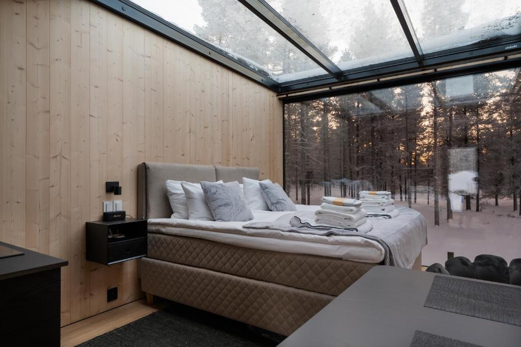 Voodi või voodid majutusasutuse Aurora Igloo Village Ylläs Luna Suite toas