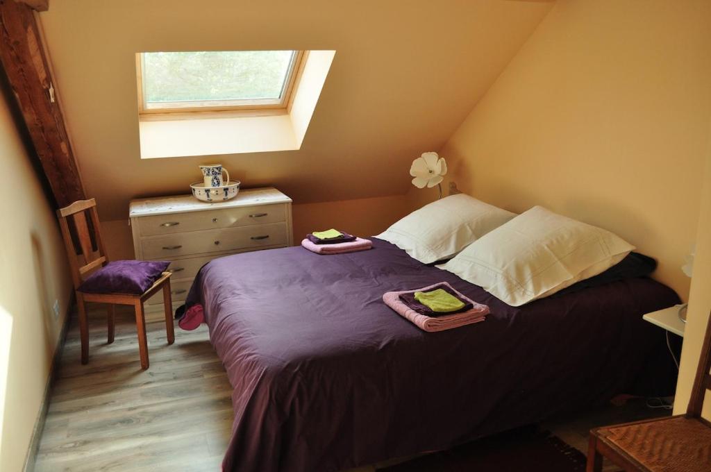 En eller flere senge i et værelse på La Reine des Prés