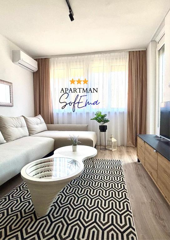 TV a/nebo společenská místnost v ubytování Sofema