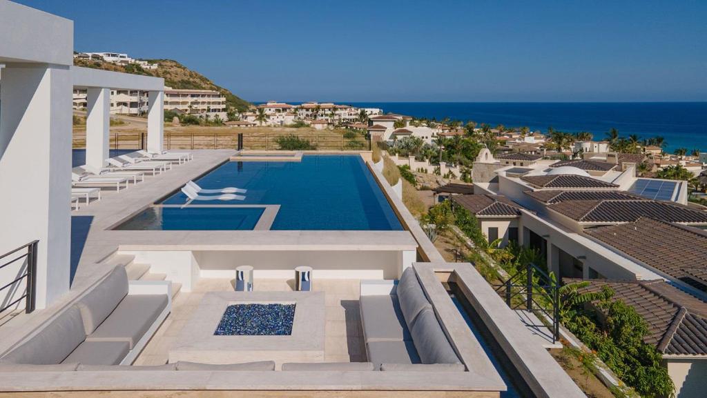 an aerial view of a house with a swimming pool at Poco Paraiso in San José del Cabo
