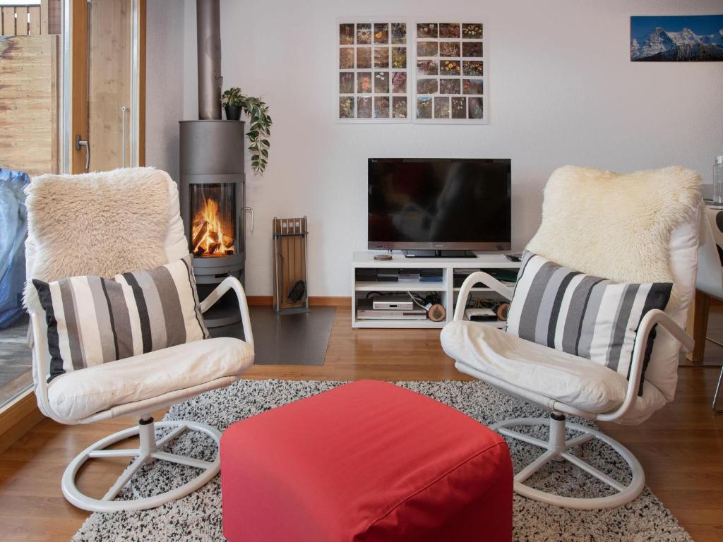 Μια τηλεόραση ή/και κέντρο ψυχαγωγίας στο Apartment Racer's Retreat Apt-12 by Interhome