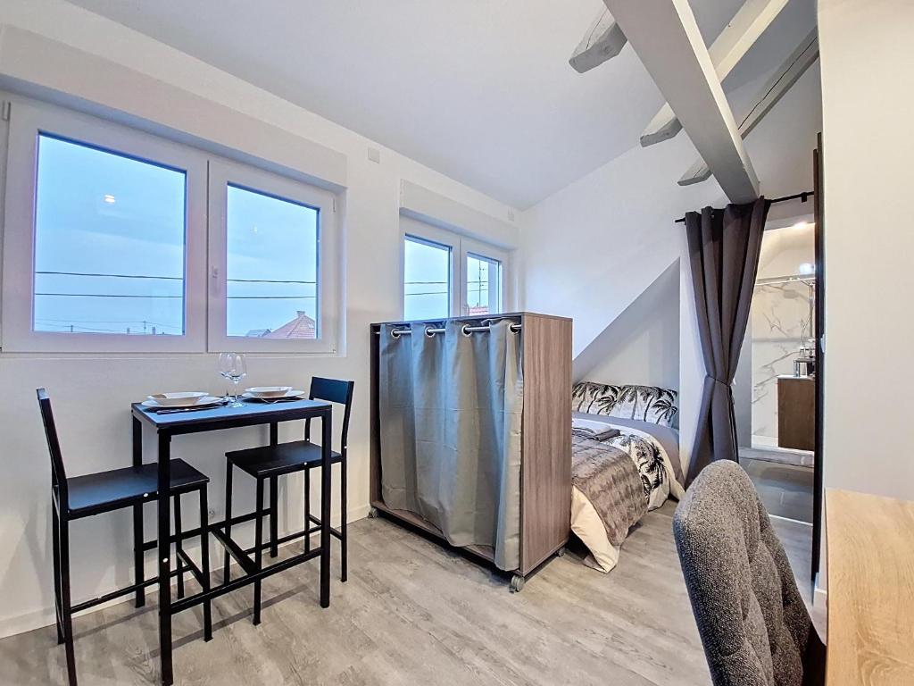 Una cama o camas en una habitación de Illkirch-issime 3 - Neuf - Tram - Proche centre-ville - Moderne