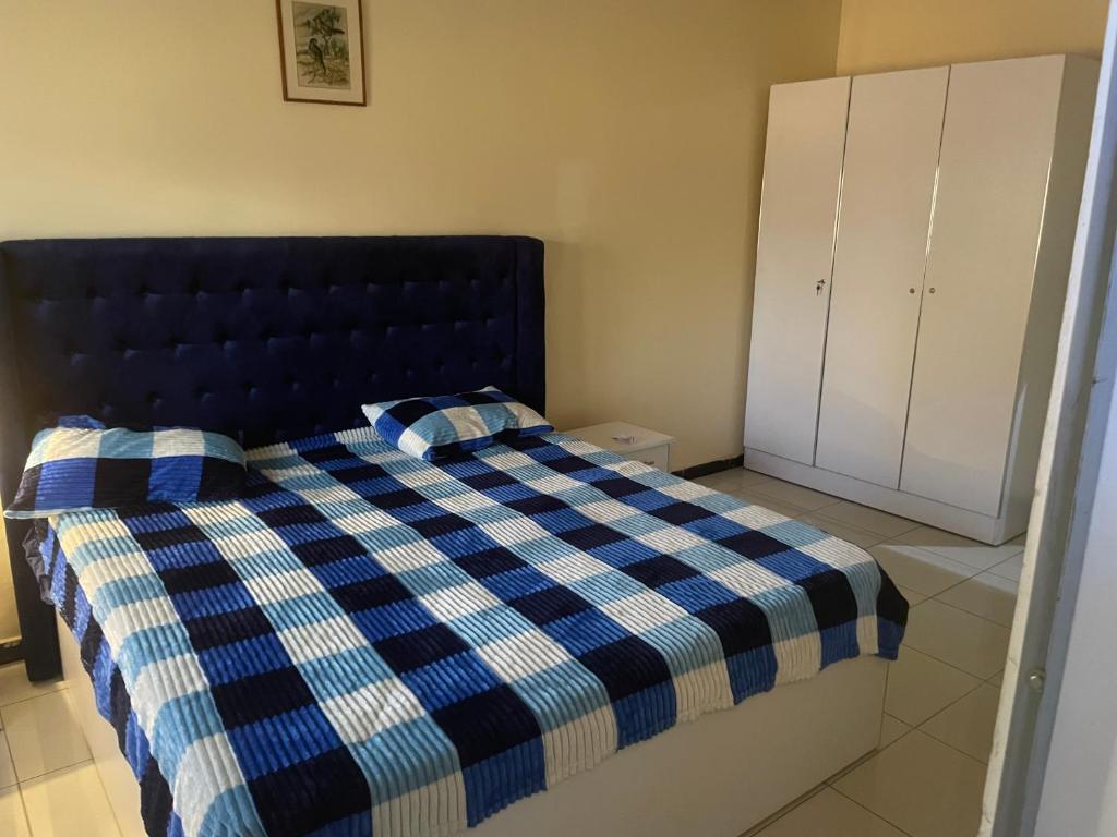 Ένα ή περισσότερα κρεβάτια σε δωμάτιο στο Paradis a Thies