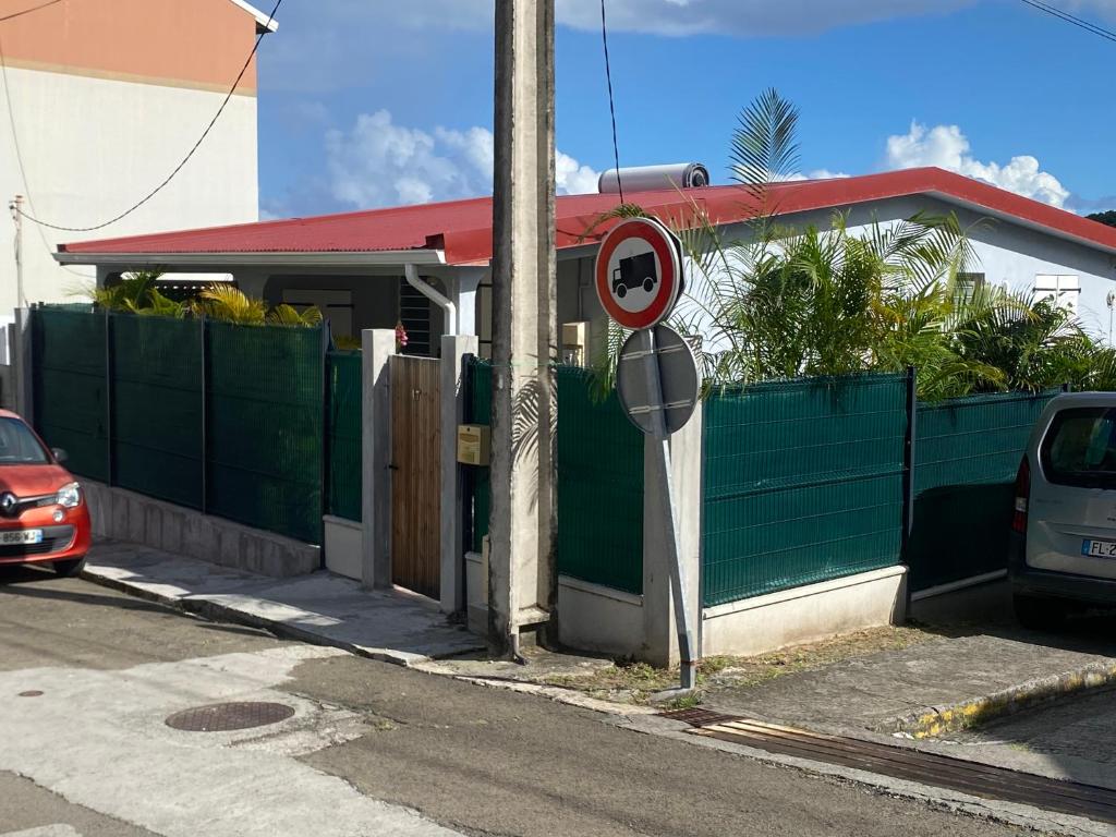 a no right turn sign in front of a building at La Casa Moueza in Le Vauclin