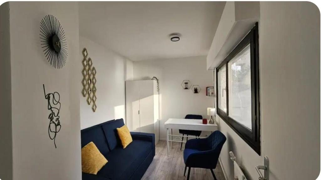 Гостиная зона в Chambre Sérénité - Vue Lac & 20 min Paris