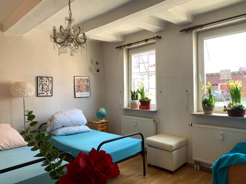 Ένα ή περισσότερα κρεβάτια σε δωμάτιο στο Brakel Monteu -Ferin Wohnung 1-5xDouble Zimmer