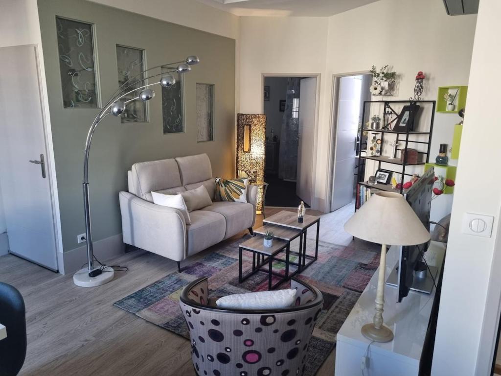 Khu vực ghế ngồi tại Calme et confort centre ville avec parking privé