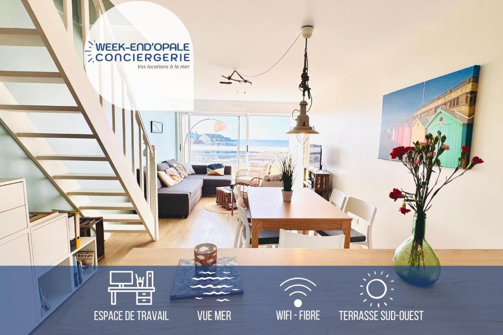 a view of a living room and dining room with a table at Vue d'Opale - Appartement vue mer Stella-Plage in Stella-Plage