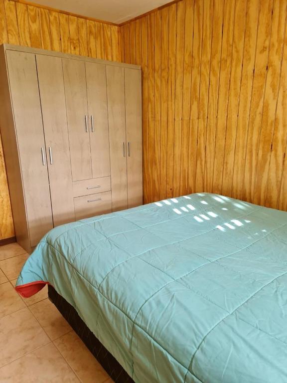 Ένα ή περισσότερα κρεβάτια σε δωμάτιο στο Cabaña pucura